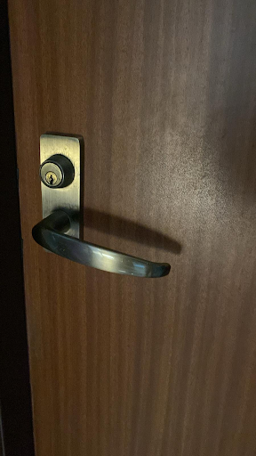 Clementi locksmith repairing digital lock at Parc Clematis condo